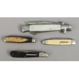 Four vintage pocket knives including one by John Nowill & Sons Sheffield.