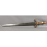 A large decorative Claymore style sword with brass cross guard and handle and with etched