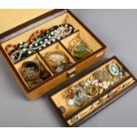A jewellery box containing mixed costume jewellery, some vintage including abalone brooch,