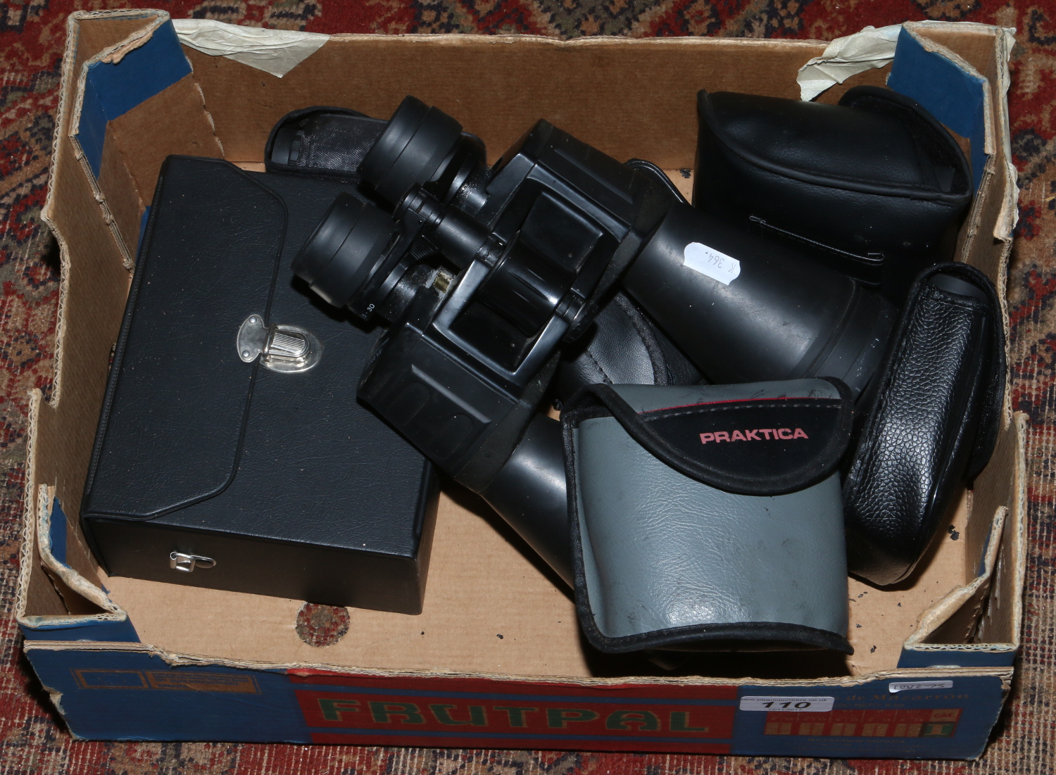 A box of mainly cased binoculars to include TCM, Praktika etc.