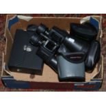 A box of mainly cased binoculars to include TCM, Praktika etc.