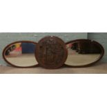 Two framed oval bevel edge wall mirrors along with carved mahogany plaque oriental scene.