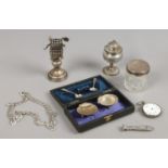 A group of silver and white metal items including a necklace, pocket watch (missing glass) wax seal,