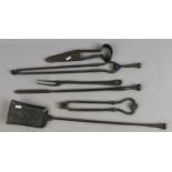 Victorian cast fire irons, five pieces and a pair of shears.