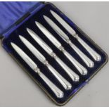 A cased set of six George V silver handled fruit knives, assayed Sheffield 1926.