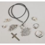 A group of silver items including a Harley Davidson motor cycles pendant, rings, crucifix etc.