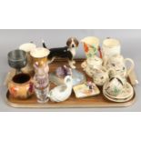 A tray of mixed ceramics and glasswares to include Sylvac, Caithness, Tetley commemorative tankards,