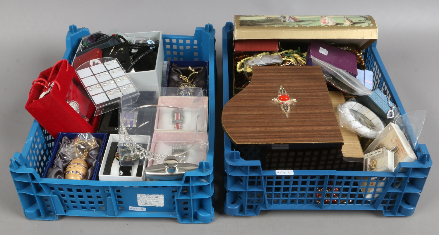 Two trays of costume jewellery wristwatches, beads, earrings and bangles etc.