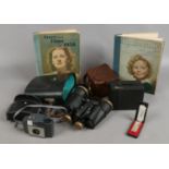 A group of collectables to include Tecnar binoculars, two vintage Kodak cameras,