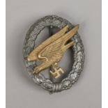 A World War II German Third Reich paratroopers badge makers mark B. H. Osang Dresden.