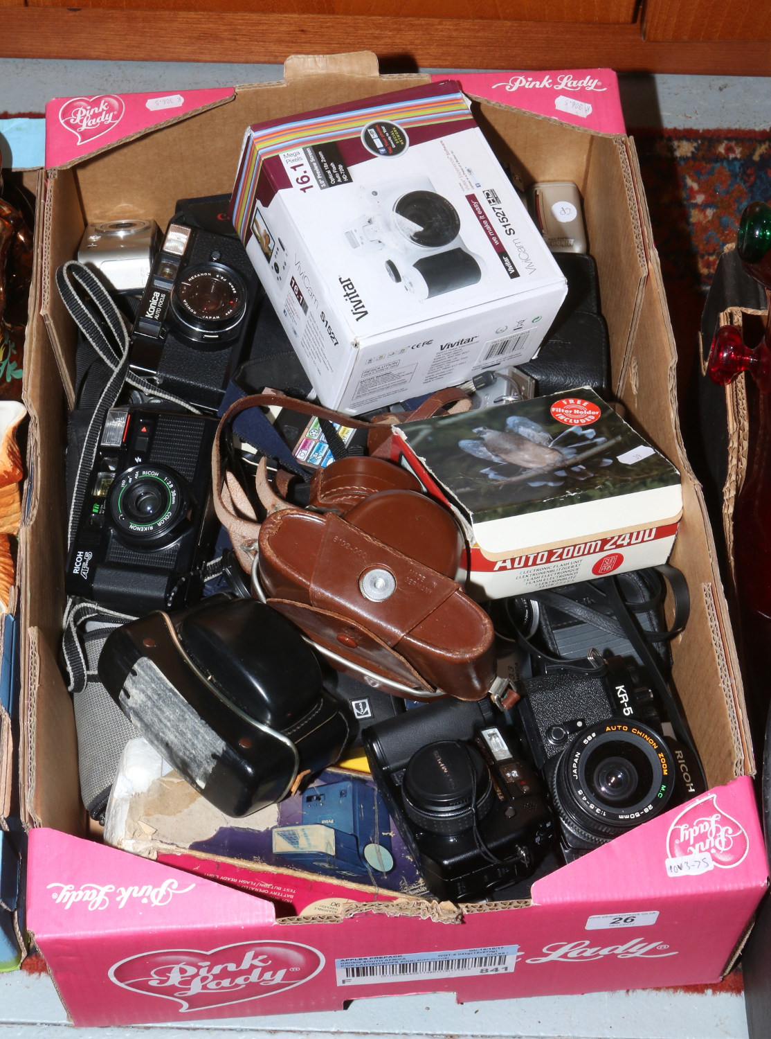 A box of various cameras to include Canon, Olympus, Konica etc.