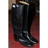 A pair of black leather riding boots by Marlborough, size UK 8.