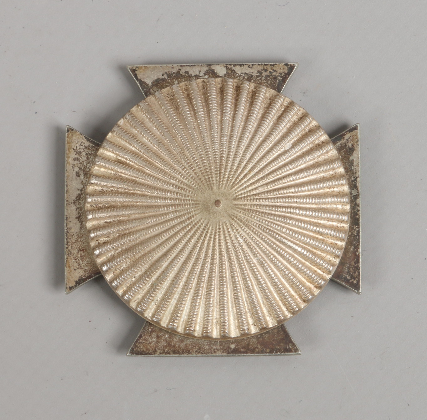 A World War II German Third Reich iron cross merit badge, 1st class with screw back. - Image 2 of 2