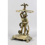 A brass figural stickstand.