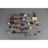 Selection of vintage badges