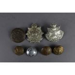 A Small quanity of military badges and buttons including reproduction 5th Battalion Border Regiment,