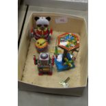 Box of clockwork toys