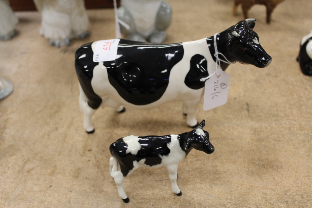 Beswick fresian cow & calf