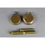 3 Trench Art lighters, two being formed with coins and one of bullet form.