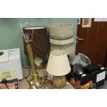 Three pottery electric table lamps and a brass ditto