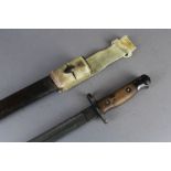 1907 Pattern bayonet dated 1915 by Remington held with webbing frog.