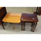 Nest of three mahogany occasional tables and a teak drop leaf Sutherland table