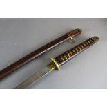 A Japanese katana having brass pommel and shagreen style and leather covered handle. Brass tsuba