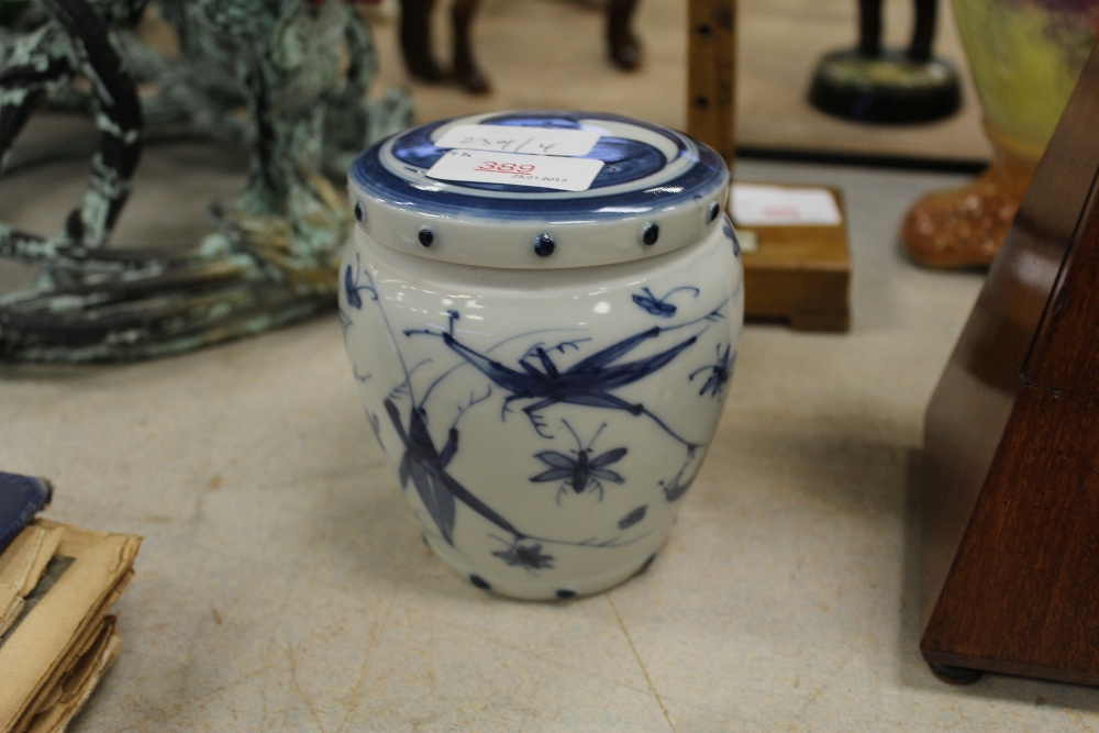 Blue and white pottery lidded jar with insect designs (Chinese?)