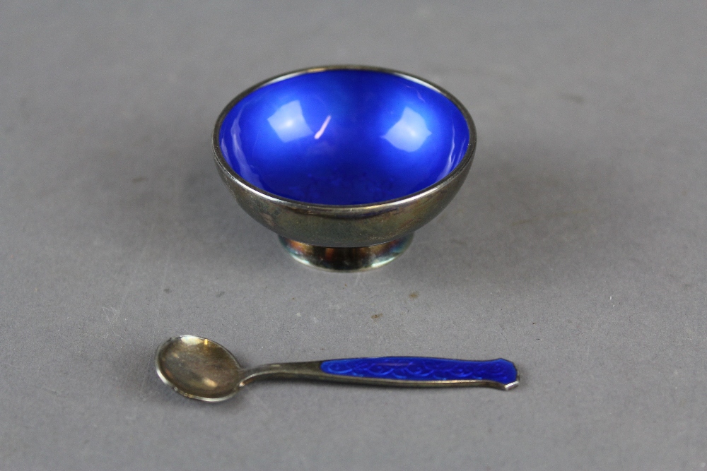 A Danish blue enamelled silver salt and salt spoon by Meka, the salt 5cm diameter x 2.5cm high