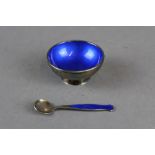 A Danish blue enamelled silver salt and salt spoon by Meka, the salt 5cm diameter x 2.5cm high