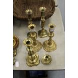 Georgian brass taper stick & 3 other brass candlesticks