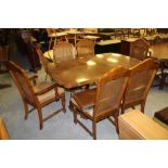 Modern extending dining table & 6 cane backed chairs