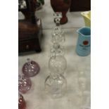 Pair of glass candlesticks & 2 decanters