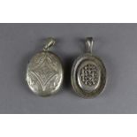 2 white metal lockets