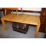 Modern solid oak extending dining table