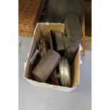 Box of vintage storage tins, hot water bottles etc