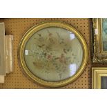 Oval gilt framed embroidery