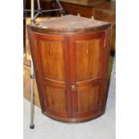 19th century mahogany bow-fronted corner cupboard