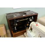 Cased singer sewing machine