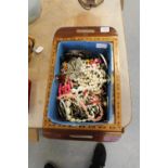 Box of jewellery on butterfly wing tray