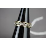 White & yellow metal full eternity ring 3grams