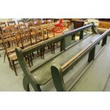 Green stained pitch pine pew with upturned y ends 356cm long