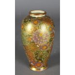 A Japanese Satsuma pottery 'Thousand Flowers' vase, decorated in colours and gilding, 16cm high,