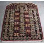 Turkoman prayer rug or ennssi, with angled top corners, 137cm x 108cm Good condition