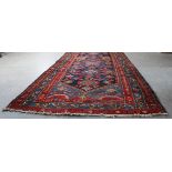 Antique Hamadan runner, 598cm long x 102cm wide Good overall condition, some slight loss and