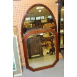 Oval mirror and carved rectangular mirror