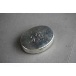 A George V silver oval snuff box, Birmingham 1917, weight 12.5g, engraved