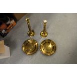 Pair of twist brass candlesticks and Canongate plates