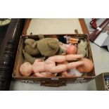 Case containing dolls, teddies etc