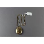 9ct gold locket with yellow metal chain (thought to be gold) 35g total